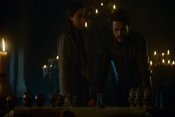 sitting by the fire,
surrounded by their families,