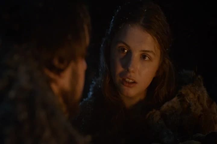 The Father's face is stern and strong