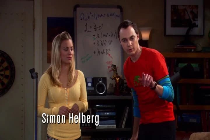 He's holding the phone to his left ear.
Ears do not cross hemispheres.